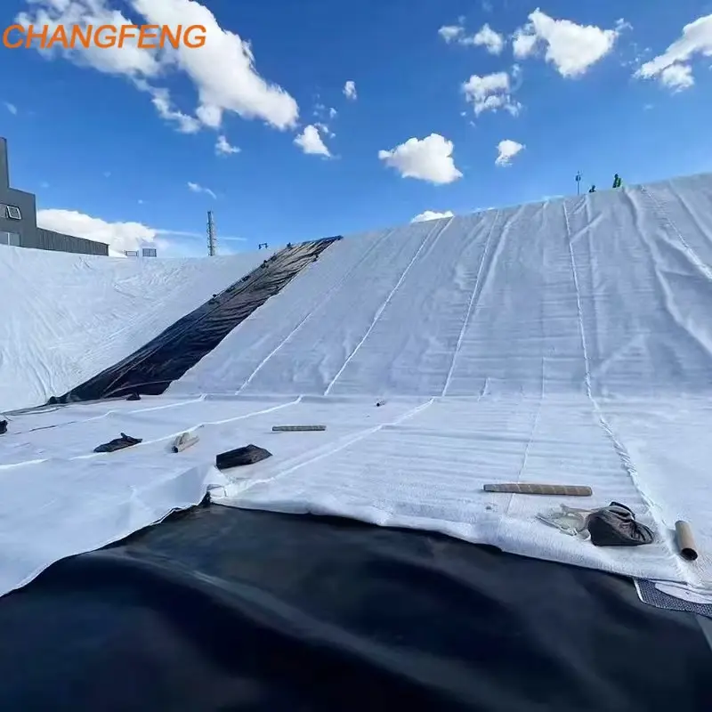 White geotextile liner installed on a large slope